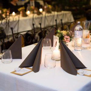 An elegant table set up in a wedding reception