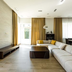interior of empty modern living room with sofa and lamp