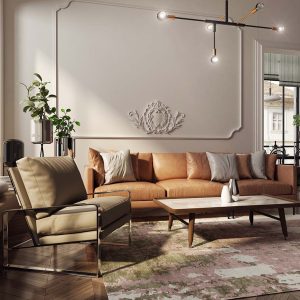 Modern and spacious apartment in an antique tenement house. An elegant and luxurious living room with a comfortable sofa and armchair.